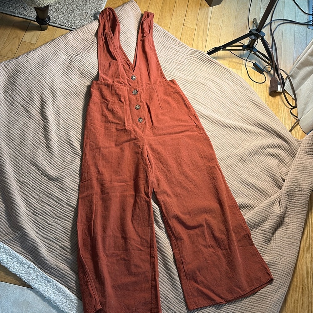 Sienna sky jumper rust Pantone color of year 2025